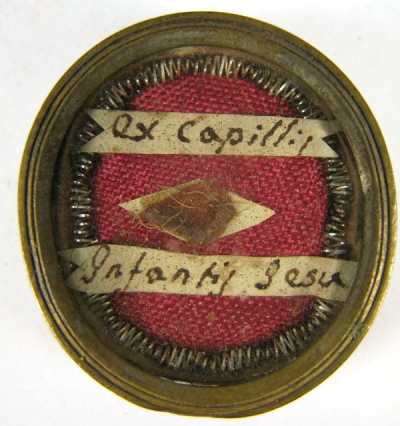 Theca with hair relics of the Infant Jesus of Prague of St Teresa of Ávila Pražské Jezulátko