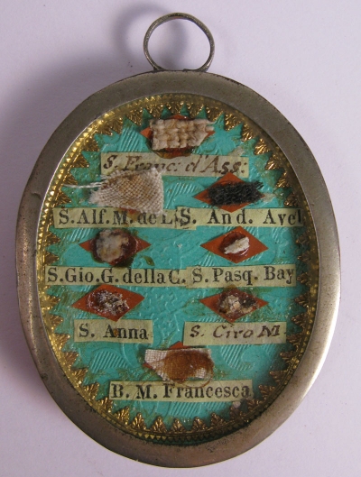 Reliquary theca with relics of St. Francis of Assisi &amp; 7 Saints: St. Alphonsus Maria de&#039; Liguori, St. Andrew Avellino, St. John Joseph of the Cross, St. Paschal Baylon, St. Anne, St. Cirus, &amp; St. Mary Frances of the Five Wounds