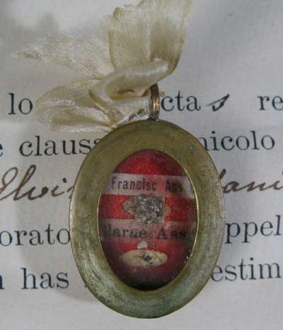 Documented theca housing relics of Saint Francis and Clare of Assisi
