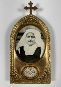Frame reliquary with hair relic of St. Therese de Lisieux, OCD (of the Child Jesus)